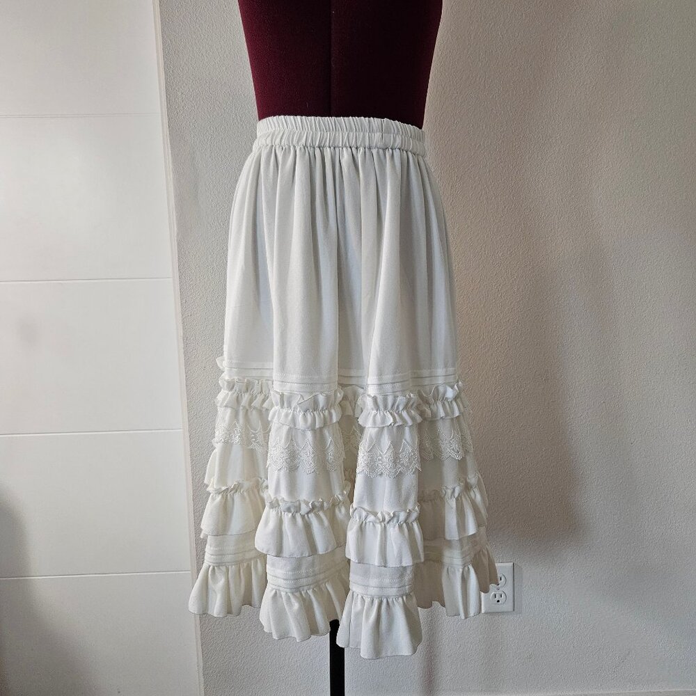 Ruffled white midi skirt